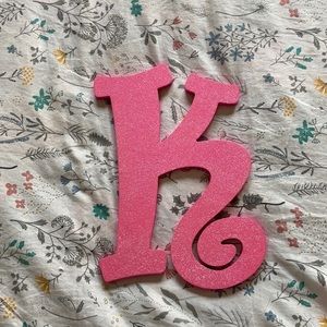 Pink glittery "K" sign